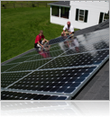4.2KW roof mounted grid tied PV with Seido 16 tube domestic hot water system with marathon water heater for storage and backup